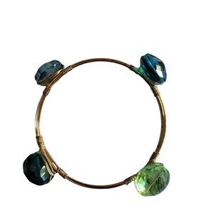 Elegant Gold  Wired Bracelet With Blue And Green Gems.